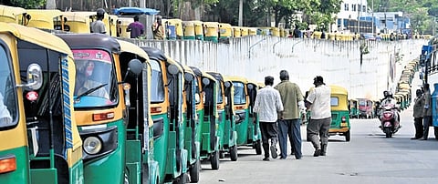 A long queue of autorickshaws waiting to fill gas at a supply station in Kengeri Satellite Town on Friday 