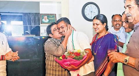 Housing Minister BZ Zameer Ahmed Khan wishes Congress Davanagere South candidate Samarth Shamanur in Davanagere on Sunday  