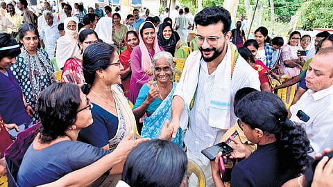 UDF candidate for Palakkad constituency Ramesh Pisharody interacting with women voters on Sunday 