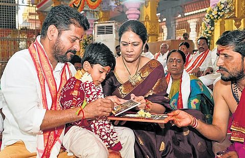Chief Minister A Revanth Reddy performs his grandson’s Aksharabhyasam at 
Sri Gnana Saraswathi Devi Devasthanam in Basara, Nirmal district on Monday