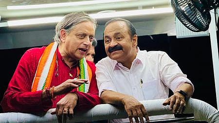 Congress MP Shashi Tharoor with Leader of Opposition in Kerala V D Satheeshan during a roadshow in Paravur.