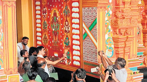 A 9-member artist team paints 1,000 sqft of mural art on the wall of Navamukunda temple 