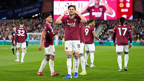 West Ham United's Konstantinos Mavropanos celebrates scoring their side's fourth goal of the game during their English Premier League soccer match against Wolverhampton Wanderers in London, Friday, April 10, 2026. 