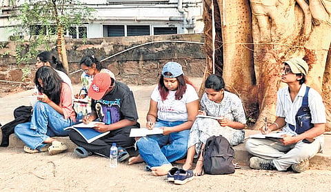 Urban Sketchers Visakhapatnam artists capture city life through live on-location sketches across iconic spots in the city. 
