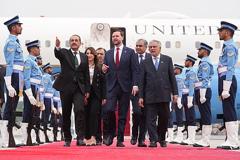 U.S. Vice President JD Vance, center, walks with Pakistan's Chief of Defence Forces and Chief of Army Staff Field Marshall Asim Munir, left, and Pakistani Deputy Prime Minister and Foreign Minister Mohammad Ishaq Dar after arriving for talks with Iranian officials in Islamabad, Pakistan, Saturday, April 11, 2026. 