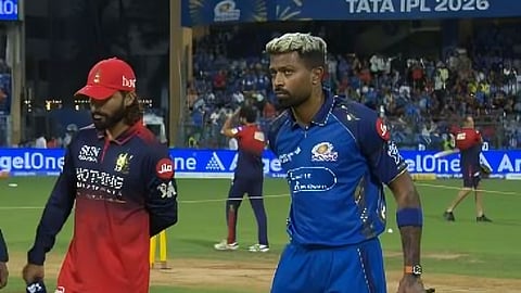 Mumbai Indians captain Hardik Pandya (R) and Royal Challengers Bengaluru captain Rajat Patidar (L).