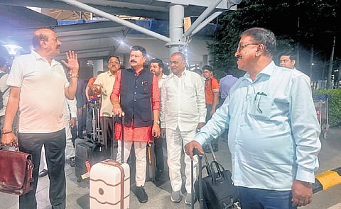 A few of the Congress MLAs from Karnataka at Delhi airport on Sunday 