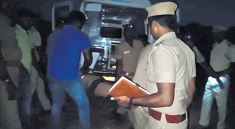 Screengrab of rescue personnel near Anumanthapuram firing range shifting the injured students into an ambulance 