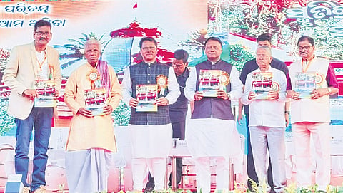 Chief Minister Mohan Charan Majhi and other guests at the event. 