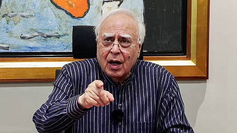 Rajya Sabha MP Kapil Sibal speaks during a press conference, in New Delhi.