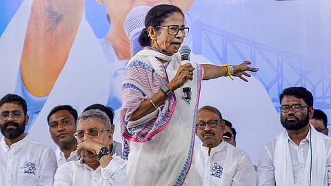 West Bengal Chief Minister Mamata Banerjee addresses a public meeting ahead of the Assembly election, in Howrah, Tuesday, April 14, 2026. 