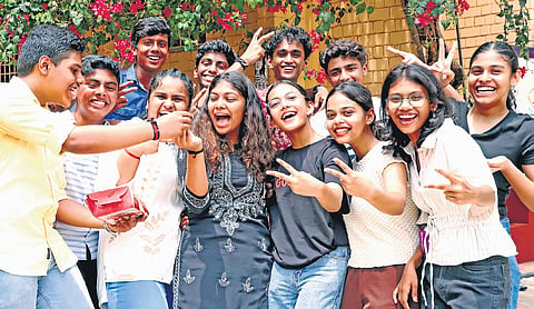 Students of Christ Nagar Central School at Kowdiar in Thiruvananthapuram celebrating after the announcement of CBSE exam results 