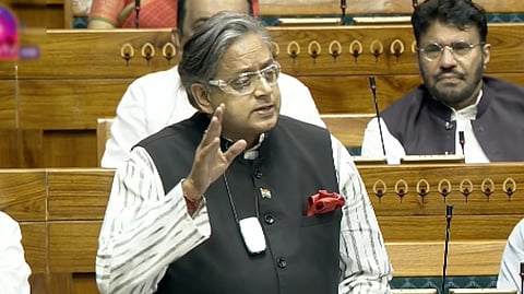 Congress MP Shashi Tharoor speaks in the Lok Sabha during the special session of Parliament in New Delhi, Friday, April 17, 2026.