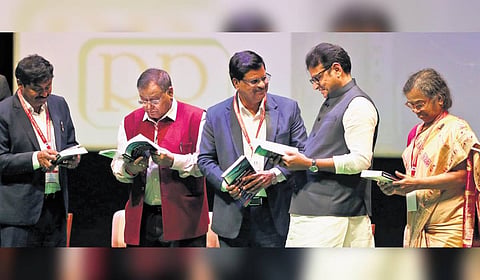 IT Minister D Sridhar Babu interacts with guests and attendees during the national conference by Aeronautical Society of India at ESCI in Gachibowli 
on Friday 