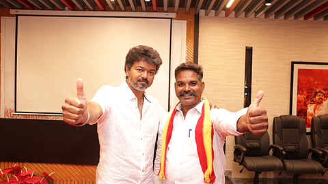 Vijay urged voters in Salem district to back K. Premakumar, a former administrator of his fan club.