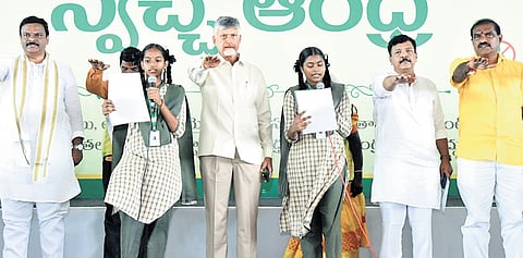 CM administering Swarna Andhra - Swachh Andhra’ oath at Nidadavole 