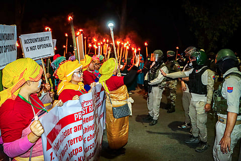 Protestors confront security personnel during a Meira (torch) rally at Koirengei, organised under the aegis of Coordinating Committee on Manipur Integrity (COCOMI), demanding justice regarding the Tronglaobi killing incident, in Imphal East 