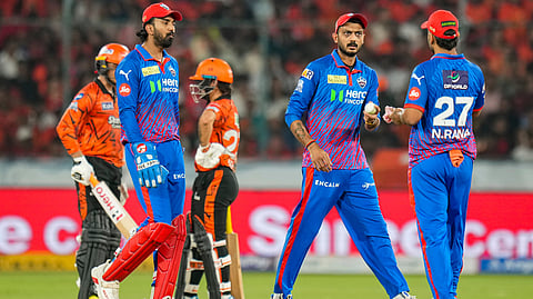 Delhi Capitals' captain Axar Patel, second right, Nitish Rana, right, and KL Rahul, second left, during the IPL 2026 T20 cricket match between Sunrisers Hyderabad and Delhi Capitals, in Hyderabad, Tuesday, April 21, 2026. 