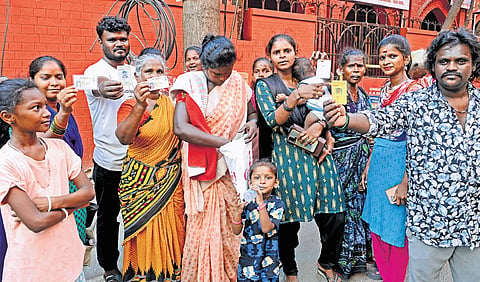 After checking for their names in four booths in Triplicane, these voters returned without voting because their names were missing from the list.