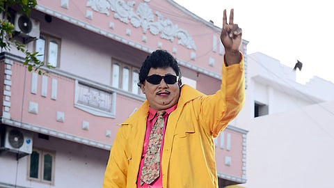 Artist E Vadivelu dressed as a former CM, late MG Ramachandran during the election campaign at Saidapet. 