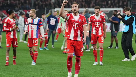 Bayern's Harry Kane celebrates after the German Soccer Cup semifinal match between Bayer Leverkusen and Bayern Munich in Leverkusen, Germany, Wednesday, April 22, 2026. 