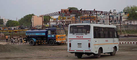 The HR&CE department installing a decorated, temporary resting station on the Vaigai riverbed for the Kallazhagar river entry on May 1 