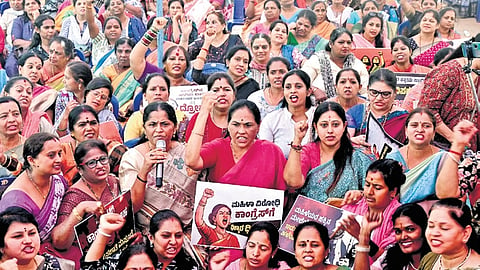 Union Minister of State Shobha Karnadlaje and Nari Shakti Forum members protest against the Congress in Bengaluru on Saturday.