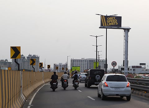  LED board and CCTV cameras being install on GD Naidu flyover in Coimbatore on Saturday.