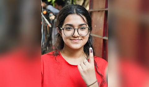1st time voter casts her vote for the Assembly elections at polling booth in Teynampet on Thursday. 