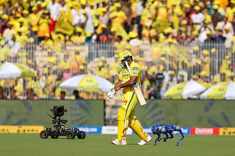 Sanju Samson walking to the middle of the pitch as CSK fans welcome him with loud roars