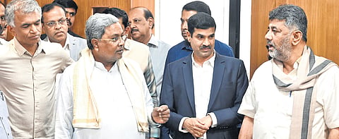CM Siddaramaiah, DCM DK Shivakumar and Revenue Minister Krishna Byregowda during the inauguration of the renovated building of Karnataka Administrative Service (KAS) Officers’ Association in Bengaluru on Monday. 