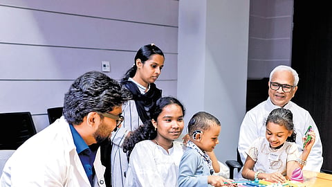 Angelo with his parents and doctors after talking to actor Mammootty