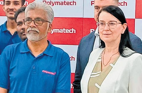 Estonia’s ambassador to India Marje Luup with an employee of Polymatech Electronics.