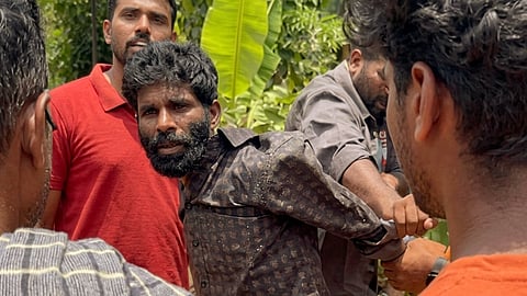 Saji had been missing when police first inspected the house compound at Pachadi, where the bodies of 70-year-old Marykutty and her son Reji were later exhumed from a freshly filled pit. 
