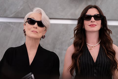 This image released by 20th Century Studios shows Meryl Streep, left, and Anne Hathaway in a scene from "The Devil Wears Prada 2." 
