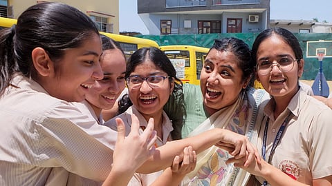 Students celebrate after the declaration of the ICSE Board Class 10th and ISC 12th results, at Lt Atul Katarya Memorial School, in Gurugram, Thursday, April 30, 2026. 