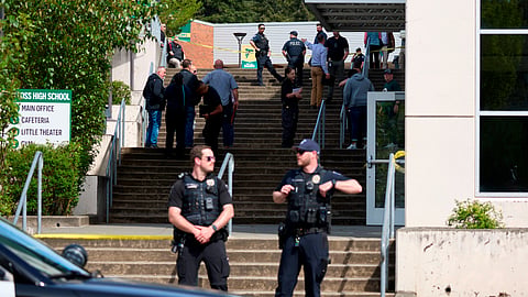Tacoma Police officers investigate after multiple people were injured in a stabbing at Foss High School, Thursday, April 30, 2026, in Tacoma, Wash.