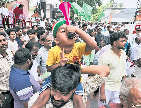 A boy during the assembly election victory celebration at Indira Bhavan in Thiruvananthapuram on Monday.