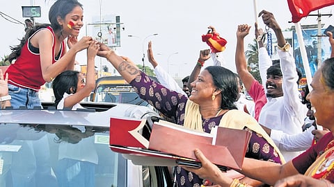 TVK cadres celebrate near Chennai after the Assembly election results on Monday.
