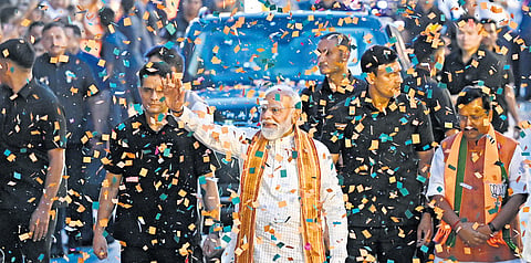 PM Narendra Modi at the BJP headquarters in New Delhi on Monday to celebrate the party’s victory in the Assembly polls.