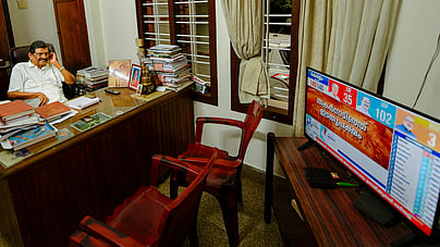Kerala Congress (J) chairman and Thodupuzha MLA P J Joseph watches the election results on television at his Purappuzha residence on