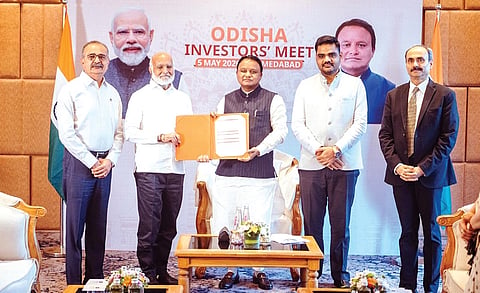 Chief Minister Mohan Charan Majhi with founder chairman of Nirma Group Karsanbhai Patel at the investors’ meet in Ahmedabad, on Tuesday | Express