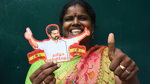 TVK party cadres celebrate at the Party head office in Panaiyur, ECR, after their party won the assembly election on Monday. 
