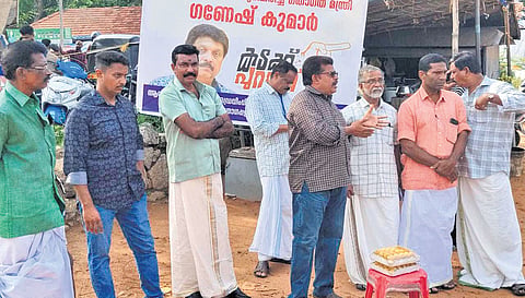 A section of driving school owners in Karunagapally celebrating the defeat of K B Ganesh Kumar