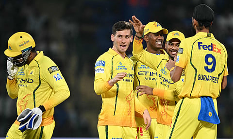 Chennai Super Kings Afghan Noor Ahmad (C) celebrates with teammates