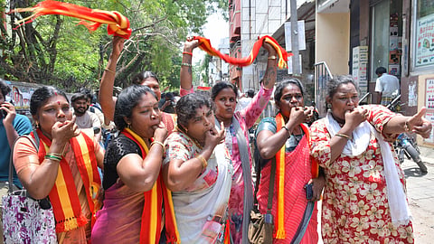 TVK supporters are seen celebrating the victory for their party at Madurai on Monday.