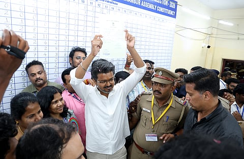 TVK Chief Vijay receives the winning certificates at the Loyola College counting centre in Chennai on Monday.