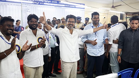 TVK chief and candidate from the Perambur constituency, Vijay, celebrates after winning in the Tamil Nadu Assembly elections results, in Chennai, Monday, May 4, 2026.