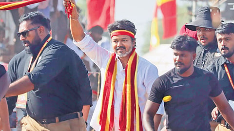 TVK president Vijay waving to his supporters during the party’s second state conference at Parapathi in Madurai district in 2025.
