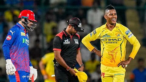 CSK's Akeal Hosein, right, reacts as Delhi Capitals' Sameer Rizvi looks on during the IPL 2026 T20 cricket match between Delhi Capitals and Chennai Super Kings, in New Delhi, Tuesday, May 5, 2026.